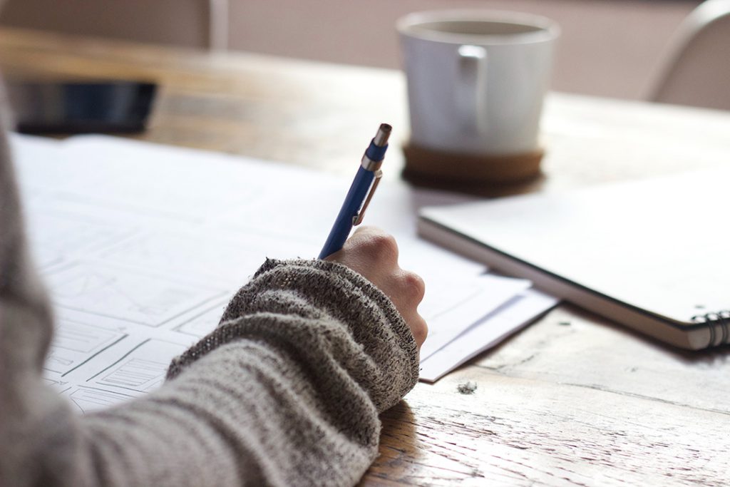 woman at a table doing a testing evaluation